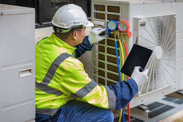 Professional Hvac technician working in Falls Church, VA